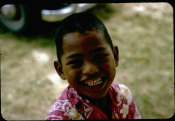 Ted Goble Collection, No. 42 Little Boy In A Red Floral Button Up Shirt